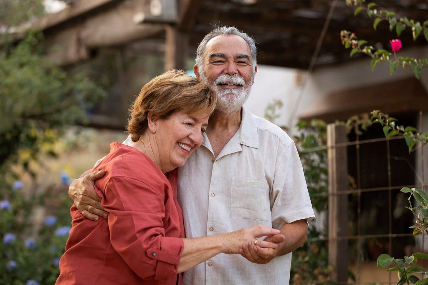 elderly-couple-holding-each-othe